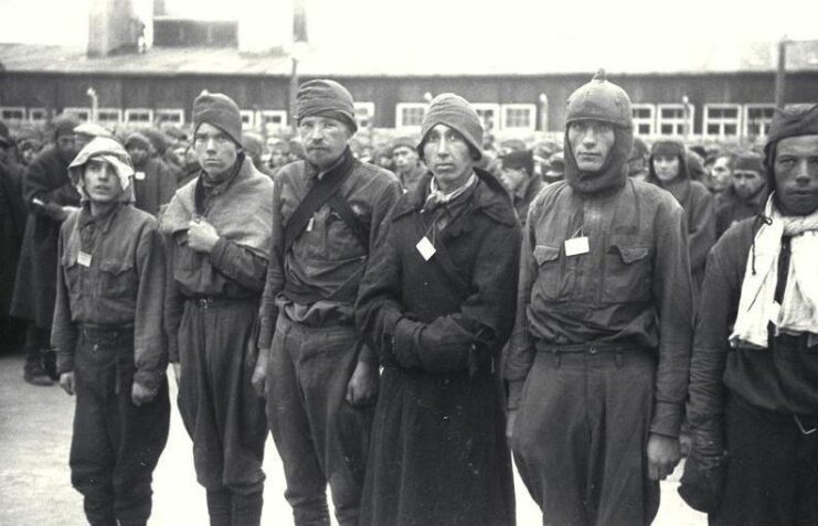 Six Soviet prisoners of war (POWs) standing together