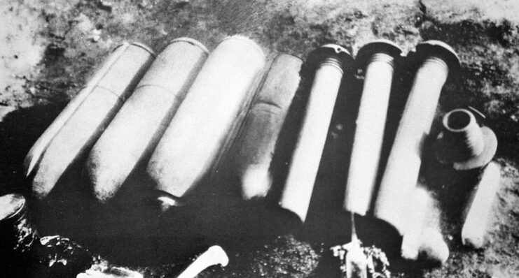 Japanese plague-bombs lined up on the ground