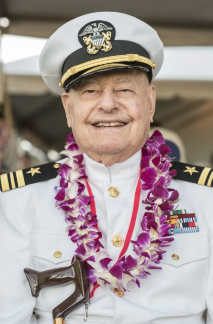 Lou Conter standing in his US Navy uniform