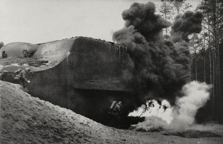 German soldiers using flamethrowers against a fort along the Maginot Line