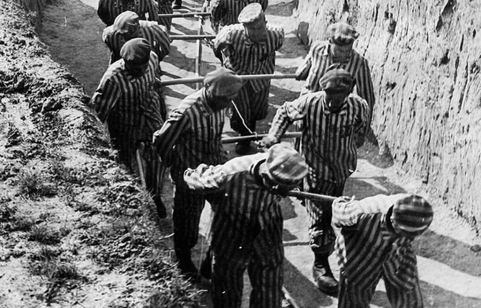 Russian prisoners of war (POWs) hauling earth in a large trench