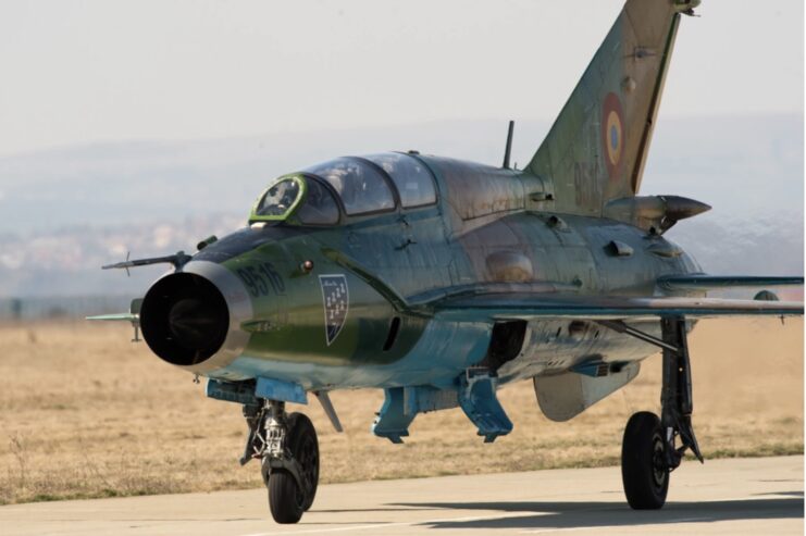 Mikoyan-Gurevich MiG-21 taxiing down a runway