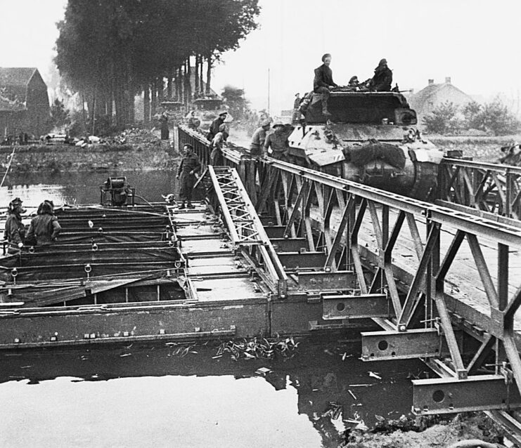 Tank driving across a bridge