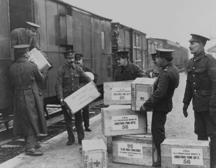 Men loading crates onto a train