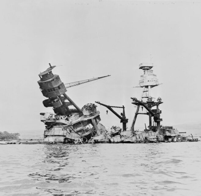 Wreck of the USS Arizona (BB-39) poking out of the water