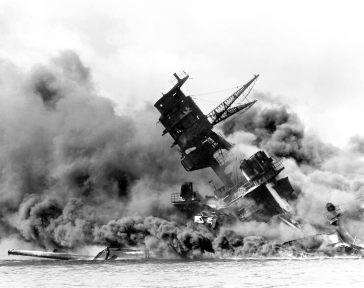 USS Arizona (BB-39) shrouded in smoke