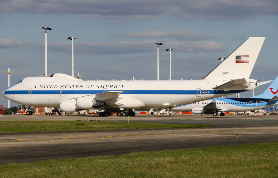 Doomsday plane parked on the runway with other aircraft