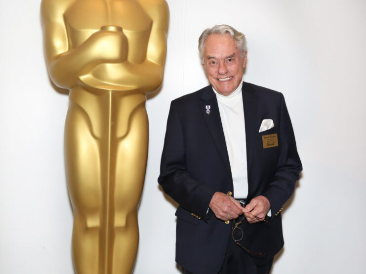 Donnie Dunagan standing on a red carpet