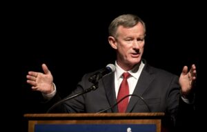 McRaven speaking at a podium.