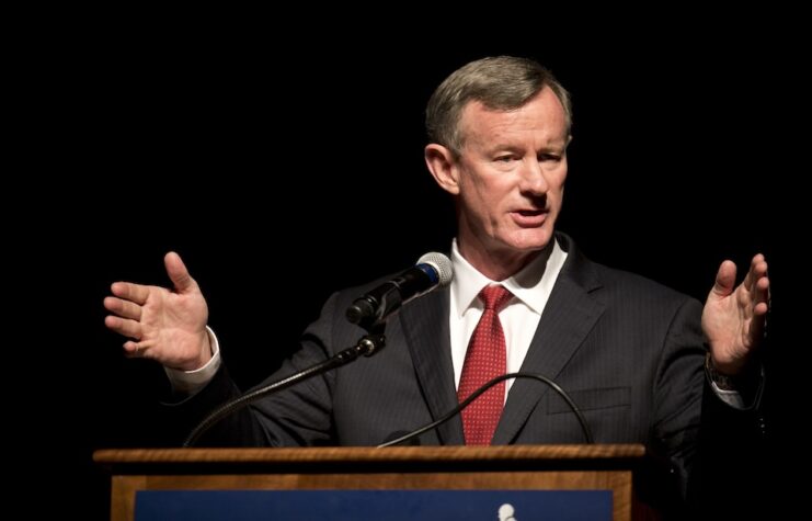 McRaven speaking at a podium.