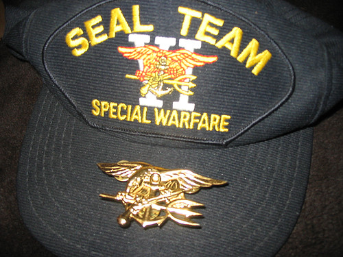 Ball cap with "SEAL TEAM VI SPECIAL WARFARE" stitched on it
