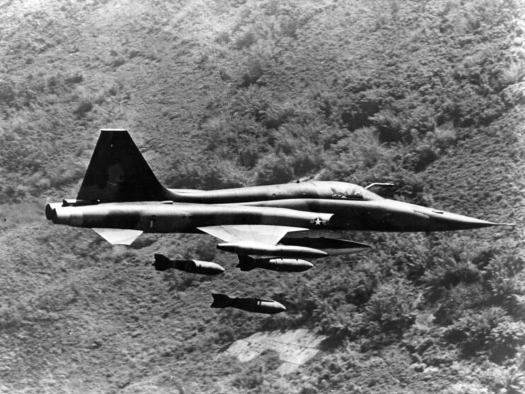 Northrop F-5C dropping munitions on the Vietnamese jungle