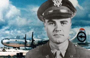 Boeing B-29 Superfortress 'Enola Gay' parked on the runway + Military portrait of Paul Tibbets