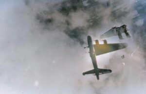 Boeing B-17G Flying Fortress 'Wee Willie' falling through clouds, with its wing detached