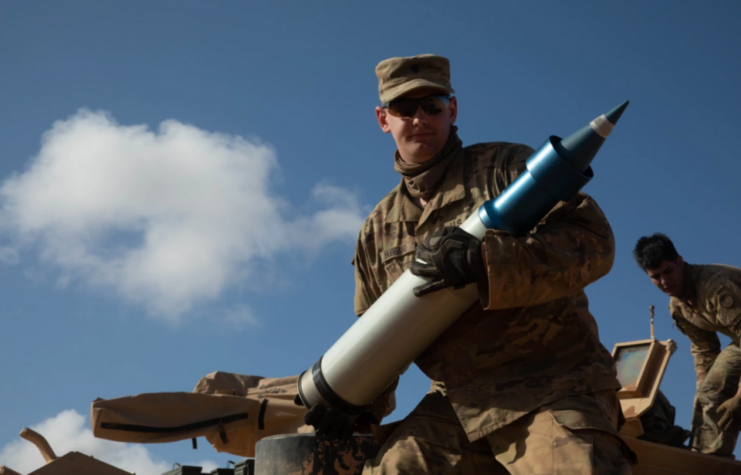 Spc. Gavin Hubbard holding a sabot round