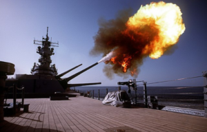 USS Wisconsin (BB-64) firing her deck guns