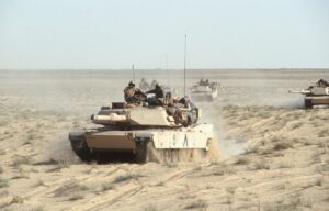 American M1A1 Abrams tanks as they cross the desert during the Gulf War, Iraq, 1991.
