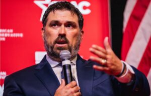Marcus Luttrell speaking at a conference.