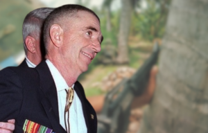 A sniper behind a tree in Vietnam + Carlos Hathcock.