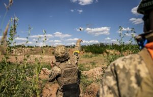 Ukrainian soldier practicing grenade throwing.