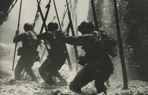AI rendering of three Japanese kamikaze frogmen underwater while holding bamboo spears