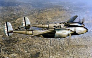 An in flight view of a Lockheed P-38 Lightning fighter used by the US Army Air Force, 1940.