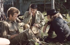 Clint Eastwood, Brian G. Hutton, and Tom Troupe behind the scenes of 'Kelly's Heroes.'
