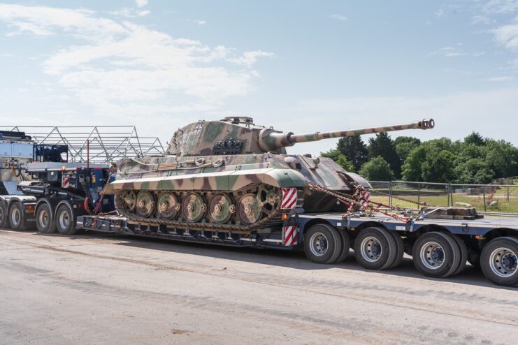 King Tiger being driven on a truck flatbed
