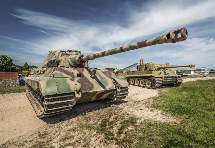 A King Tiger and Tiger 131 parked together outside