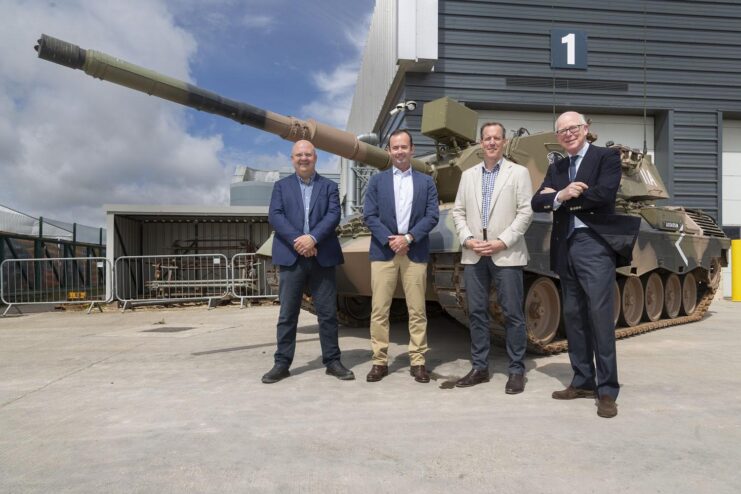 Michael King, Michael Henderson, William Rollo and Chris Price standing in front of a Leopard AS1