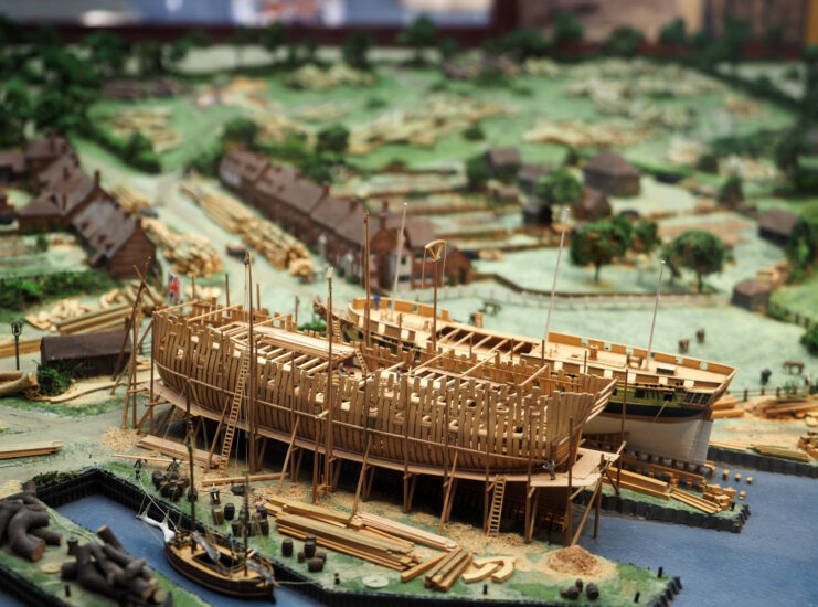 Miniature model of a 1700s-era ship on a display