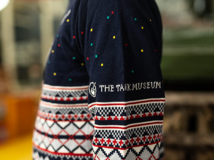 Close-up of someone wearing The Tank Museum's 2025 Christmas jumper