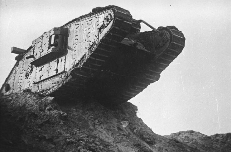 Mark IV tank driving over a ridge
