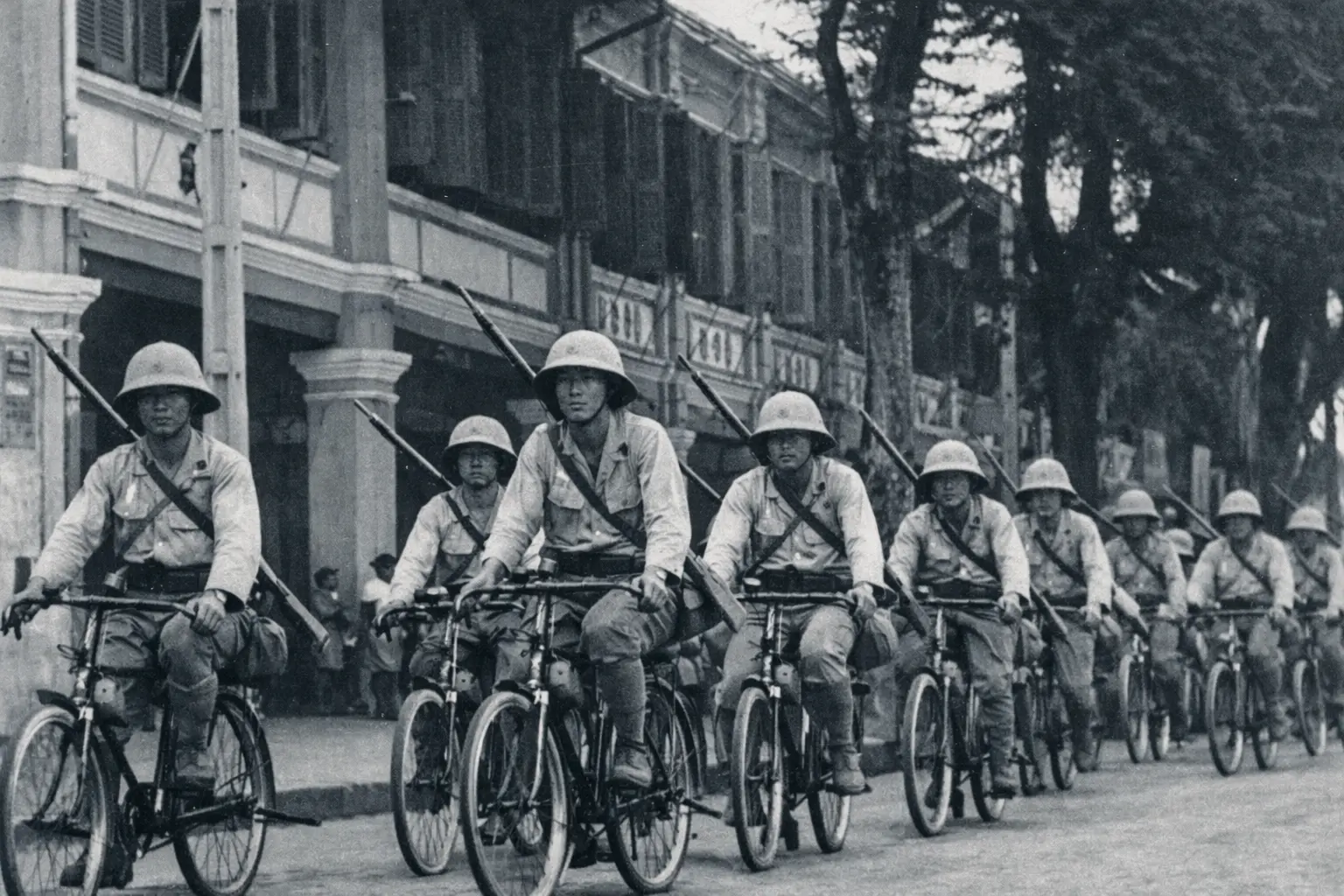 Japanese soldiers on Bicycles during the Japanese Bicycle Blitzkrieg.