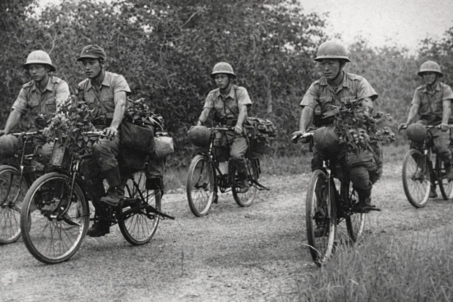Japanese soldiers on Bicycles during the Japanese Bicycle Blitzkrieg.