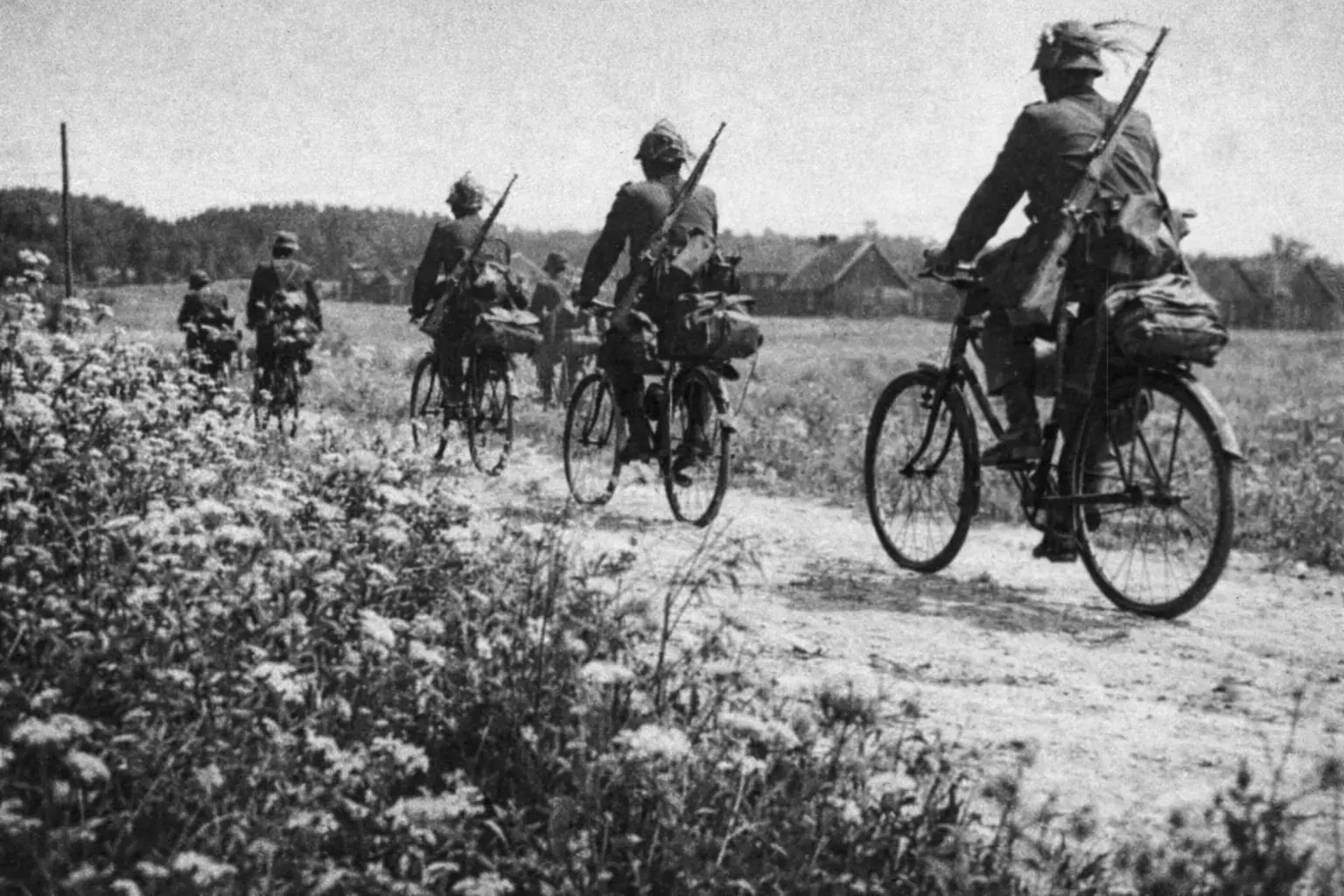 Japanese soldiers on Bicycles during the Japanese Bicycle Blitzkrieg.