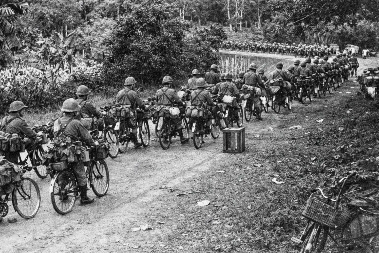 Japanese soldiers on Bicycles during the Japanese Bicycle Blitzkrieg in Singapore.