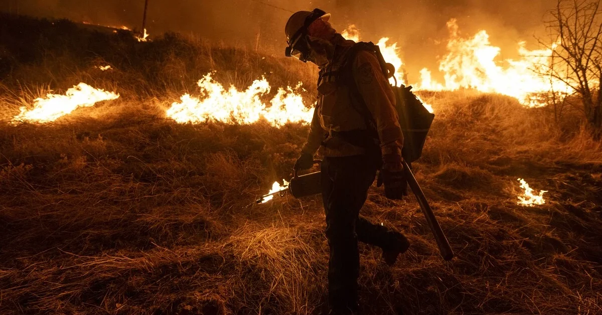 Firefighters do a prescribed burn ahead of oncoming new wildfire called 'Hughes Fire' as it tore through northern Los Angeles County, burning over 9,000 acres just hours after it was first reported in California, United States on January 22, 2025.