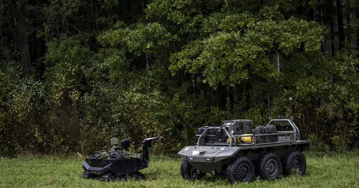 The Combat Gereon, an ARX Robotics GmbH uncrewed ground vehicle (UGV), left, and the Viking, an Iveco Defence Vehicles unmanned ground vehicle (AGV), during NATO-linked military exercises with British, Latvian, Canadian and Italian forces, in Latvia, on Sunday, Oct. 5, 2025.