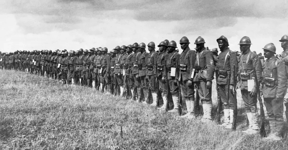Black American troops in France. Part of the 15th Regiment Infantry, New York National Guard organized by Colonel Haywood, which has been under fire, ca. 1918.