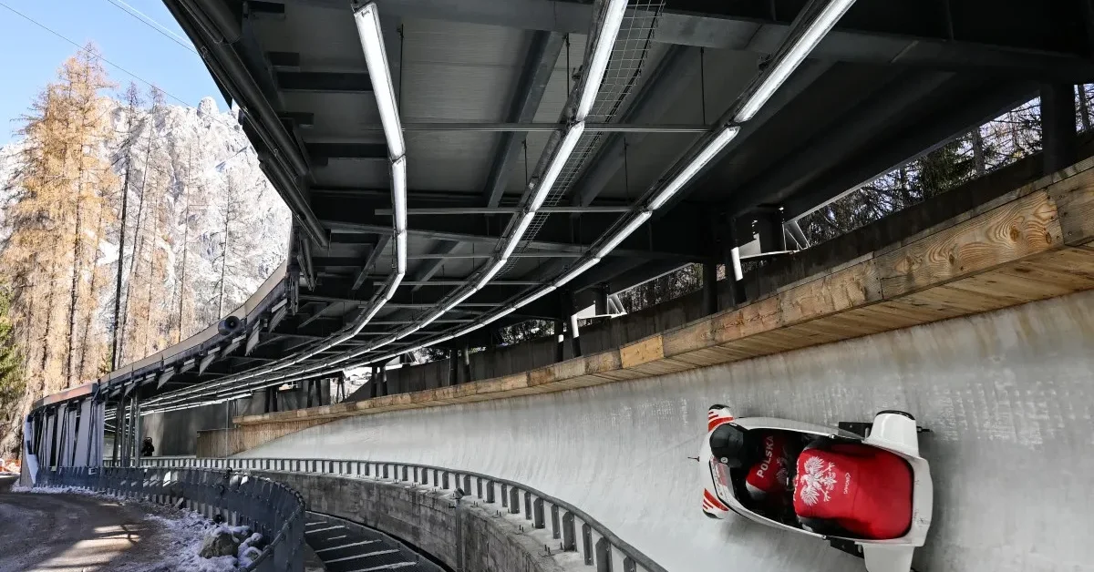 Austria's team competes in the 2-women Bobsleigh race at the IBSF Bobsleigh and Skeleton World Cup during Milano Cortina 2026 Olympic Games, test event, in Cortina, on November 23, 2025. 