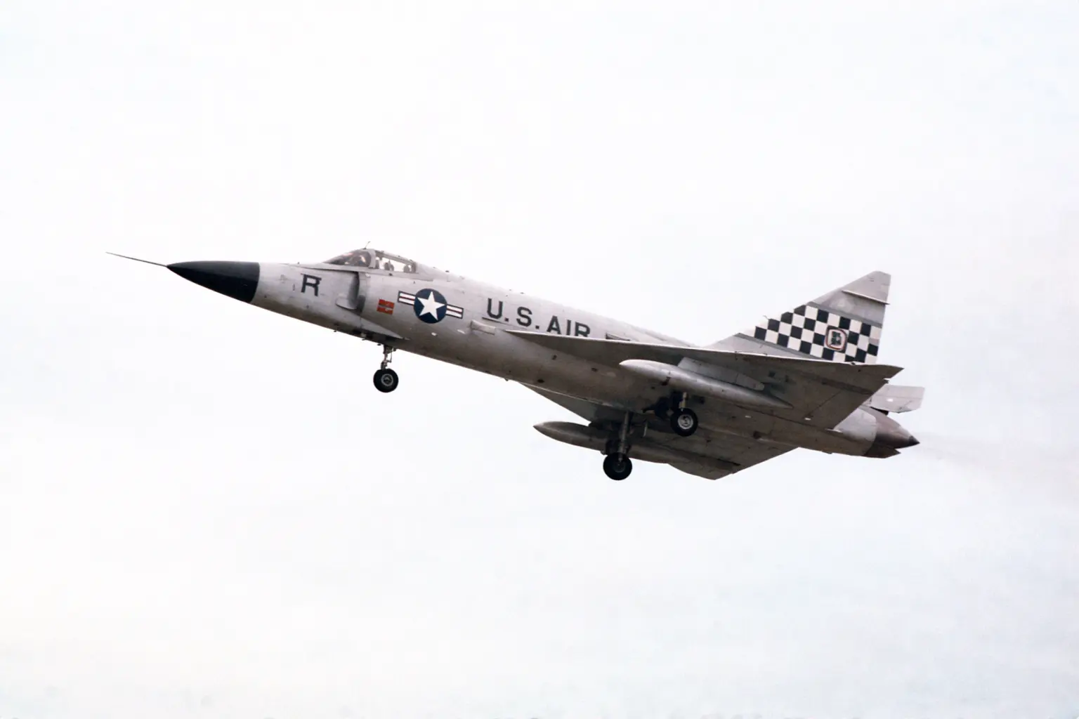 A shot of a Convair F-102 Delta Dagger shortly after take off.