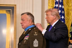 President Donald Trump awards the Medal of Honor to retired Command Sgt. Maj. Terry P. Richardson during a White House ceremony, Washington, D.C., March 2, 2026. Richardson is awarded the Medal of Honor for acts of conspicuous gallantry and intrepidity at the risk of his life above and beyond the call of duty, Sept. 14, 1968, while he was a Staff Sgt. serving as the Lima Platoon Leader with Company A, 1st Battalion, 28th Infantry Regiment, 1st Infantry Division during action in the vicinity of Loc Ninh, Republic of Vietnam.