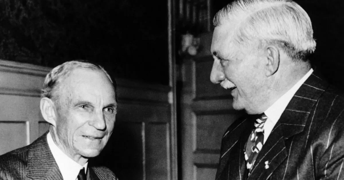 UNITED STATES - MARCH 26, 1939: Detroit, Michigan. Henry FORD, founder of the Ford Motor Company and William S. KNUDSEN, president of the company, during a dinner honoring KNUDSEN for his 60th birthday. 