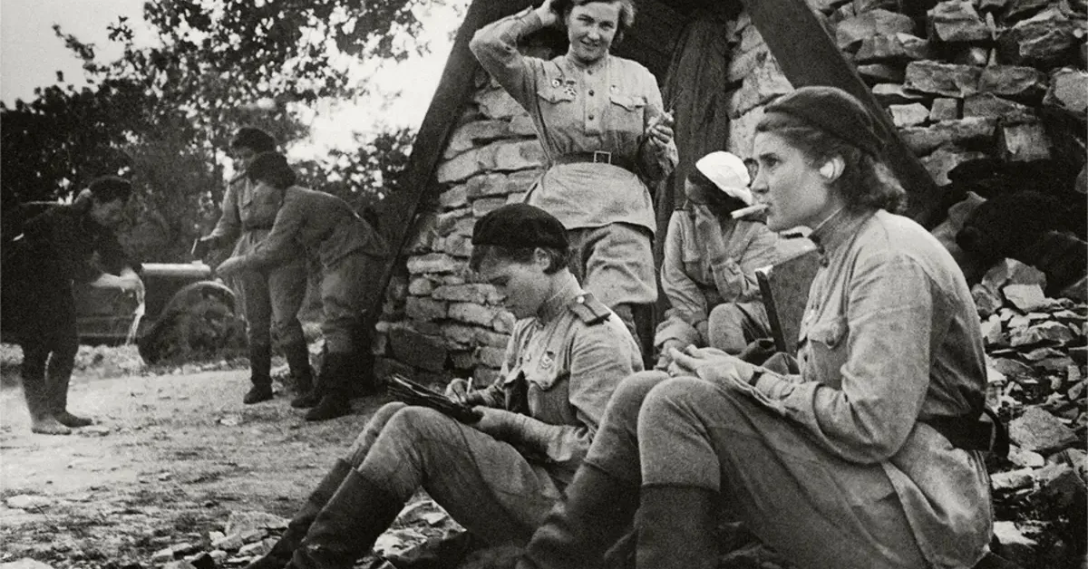 Pilots of the 46th Guards Night Bomber Aviation Regiment at a front-line dugout.