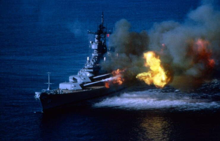 The USS Wisconsin firing weapons on board.