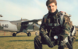 John Chapman preparing for a parachute jump.