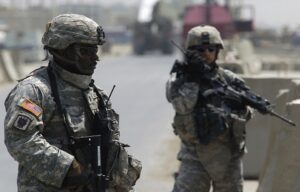 US soldiers stand guard at Kabul Jalalabad road, in Kabul.