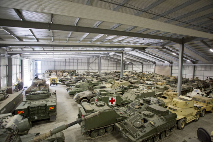 Various military tanks in a workshop