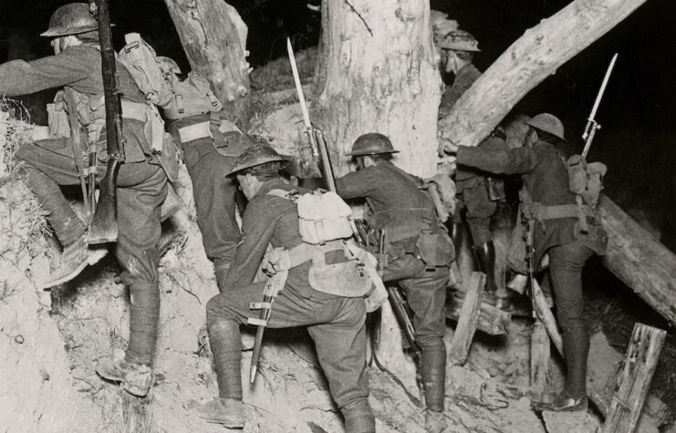 The Great War Realistic Travels Military photographs circa 1918 Leaving for a night raid at Messines British troops leave the trenches .